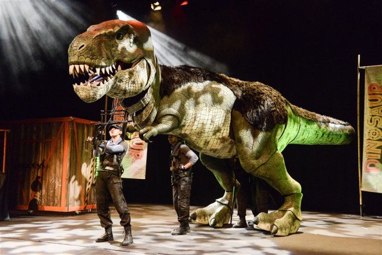 dinosaur puppet in theatre