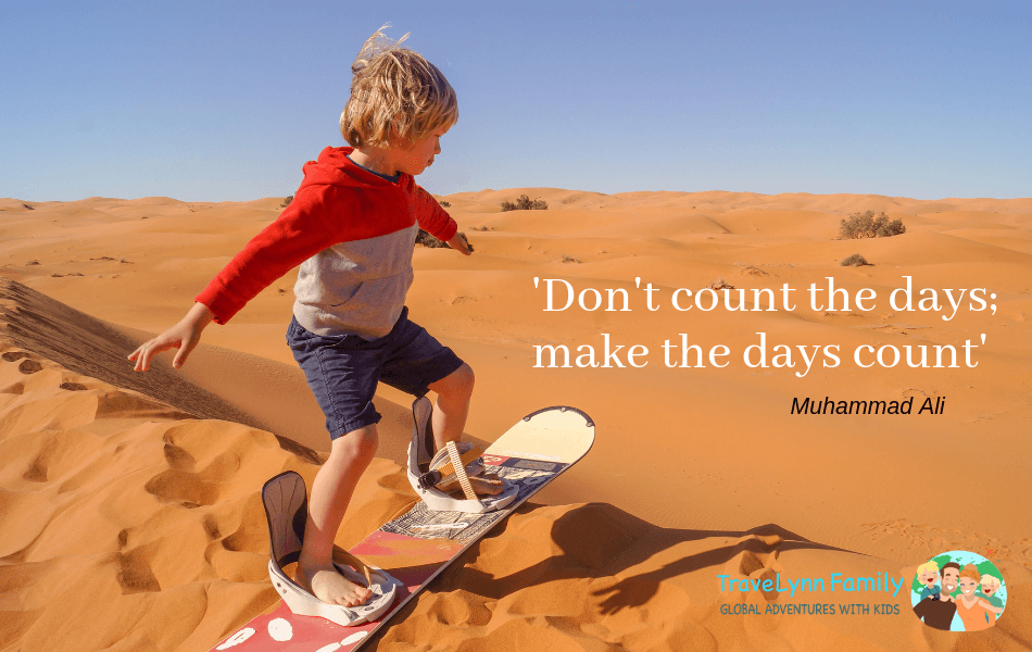 boy sand boarding and quote