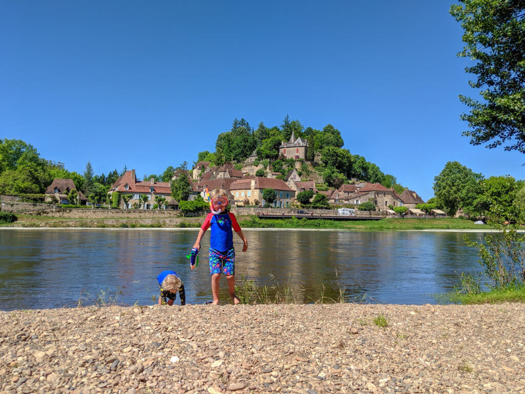 river beach in France and two boys