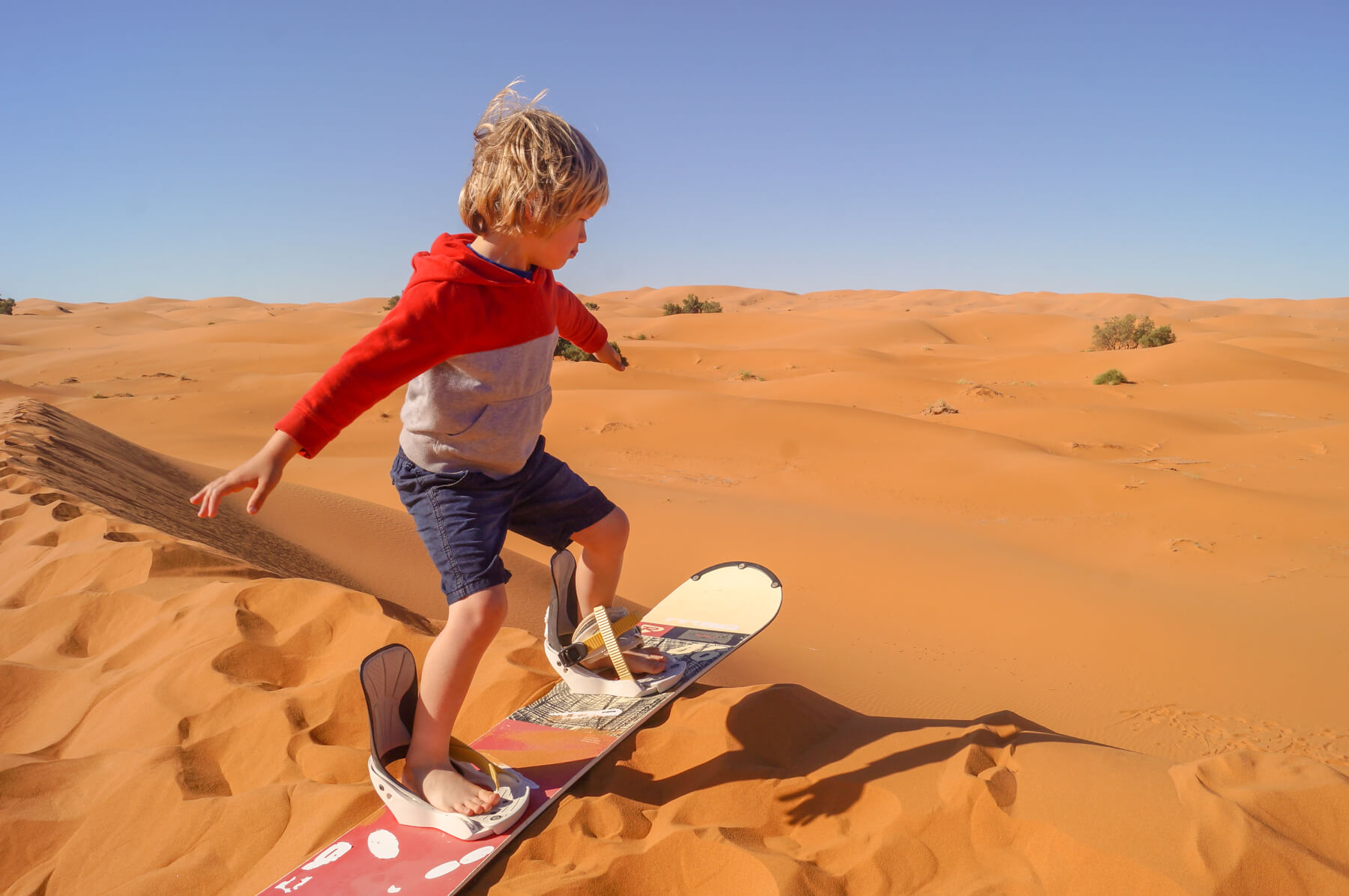 boy on sandboard