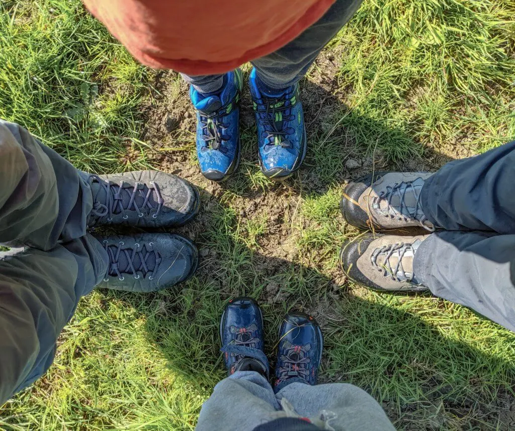 family wearing Keen hiking boots