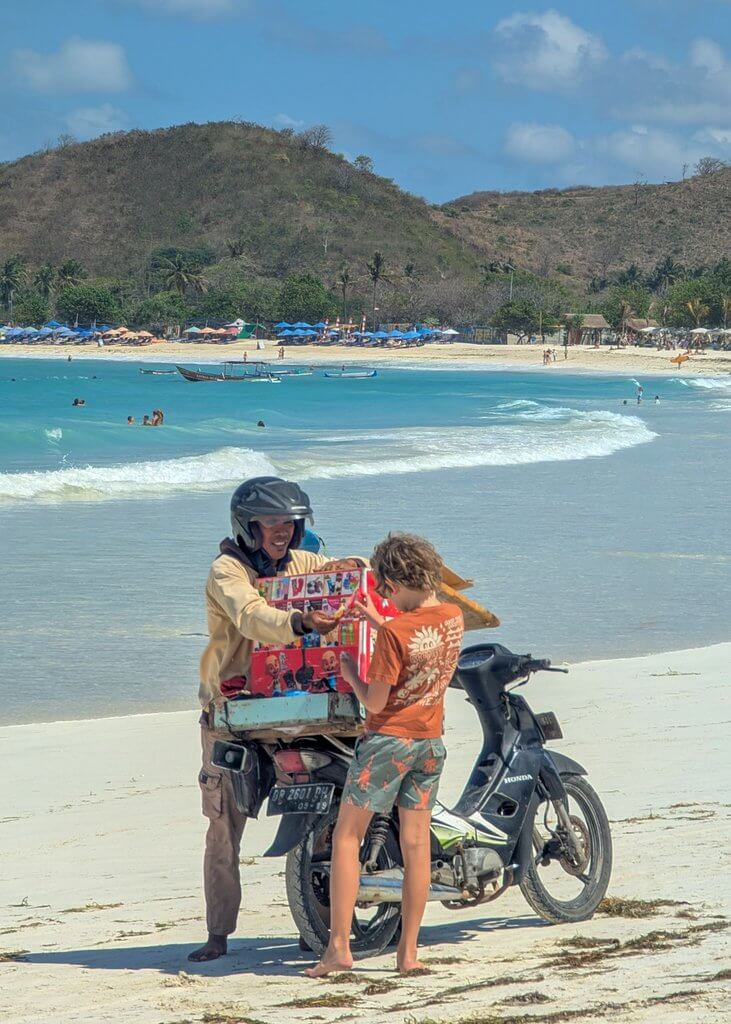 buying ice-cream at Tanjung Aan, Kota, Lombok, Indonesia